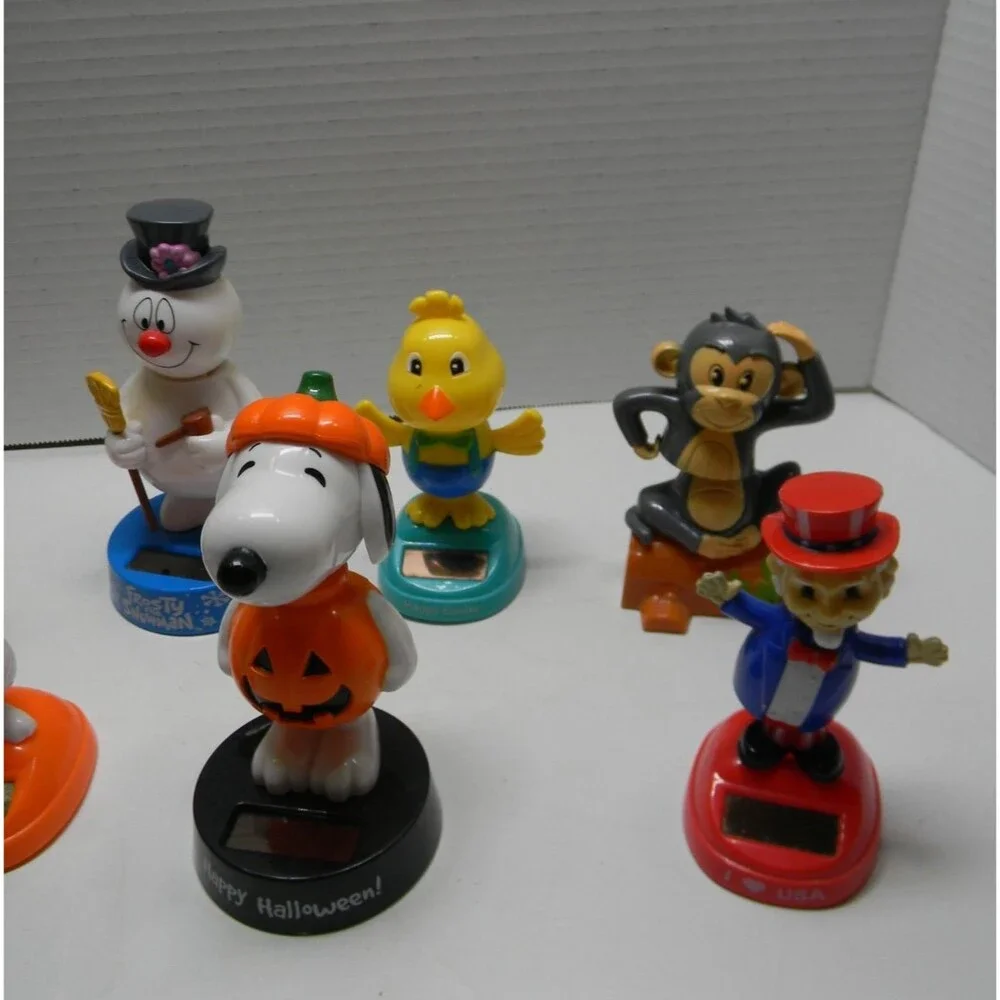 Collection of Solar Bobble Heads Lot of 7 Holidays Snoopy Christmas Easter 4th